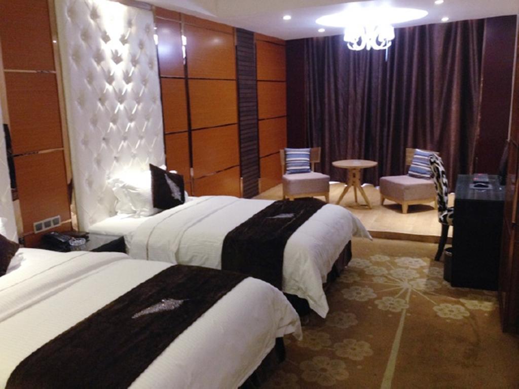 Tianguo Times Hotel Foshan Rum bild